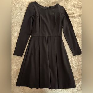 Black lined knee length dress. Like new.
